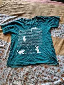 Teal graphic T-shirt in Size S