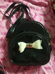 Black Backpack with Bow