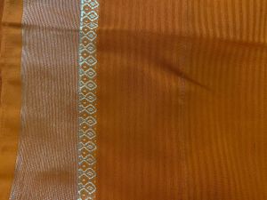 Elegant Orange Saree with Golden Border and  uns