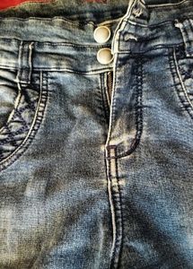 Distressed Blue Denim Jeans