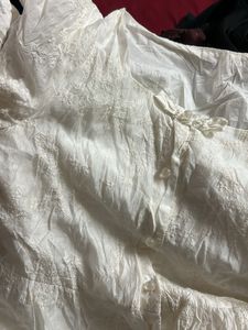 Embroidered White Peplum Blouse