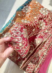 Stunning Teal Saree with Intricate Embellishments