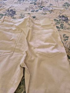 Cream Wrangler Jeans