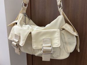 Cream/ white shoulder bag with pockets