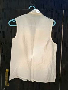 Sleeveless Twist Front Shirt