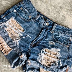 8116. Distressed Denim Shorts with Lace Trim
