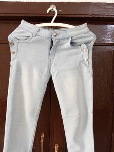 Light Wash Jeans with Button Detail