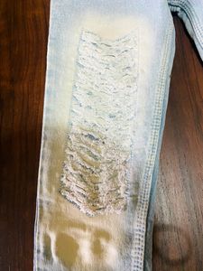 Damaged Pattern Ice Blue Colour Jeans’s….Waist: 26 Inches