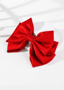 Elegant Pearl Embellished Bow Hair Clip