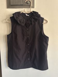 Sleeveless Black Blouse with Ruffle Collar