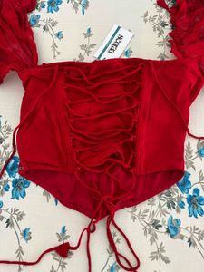 Red Off-Shoulder Corset Top with Tassels