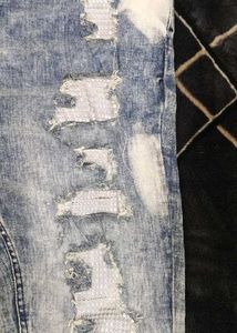 Distressed Denim Jeans