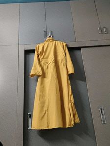 Elegant Yellow Tiered Gown