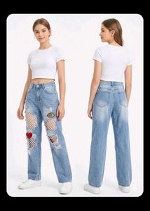 Distressed Ripped Jeans with Fishnet Detail