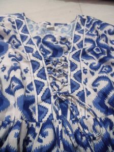 Blue Ikat Print Lace-Up Tunic Top