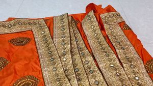 Vibrant Orange Embellished Lehenga Choli