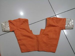 Elegant Orange Saree with Embellished Border