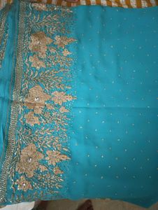 Turquoise Saree with Gold Embellishments