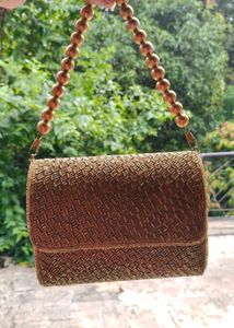Elegant Beaded Clutch with Gold Chain