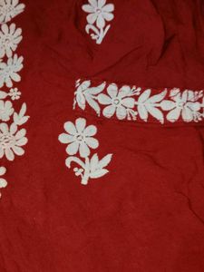 Maroon elegance paired with delicate Chikankari