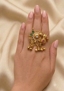 Exquisite Gold Toned Ring with Bells