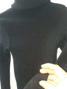 Classic Black Ribbed Turtleneck Sweater
