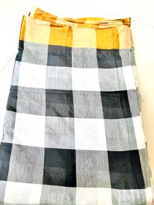 black and white chex zari border semi silk saree