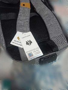 Stylish Grey Backpack with Tags