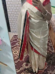 Elegant Cream Saree with Red and Black Border