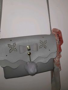 Grey Bow Detail Crossbody Bag with Pom Po