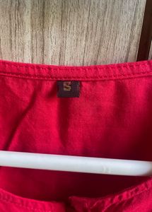 Chic Red Peplum Blouse with Tie Detail