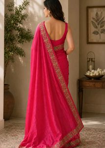 Vibrant pink Saree with Gold Border