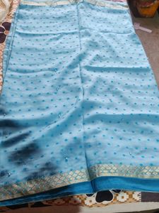 A Nice Sky Blue Saree With Beads