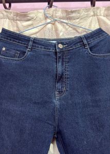 Flared Denim Jeans with Rhinestone Detail