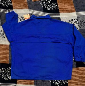 Blue "OUTRAGE" Pullover Top