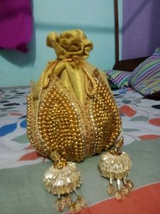 Exquisite Golden Potli Bag