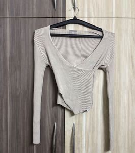 GLOW AND NYMPH Ribbed Wrap Long Sleeve Top