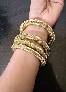 Elegant Gold Bangles with Stones