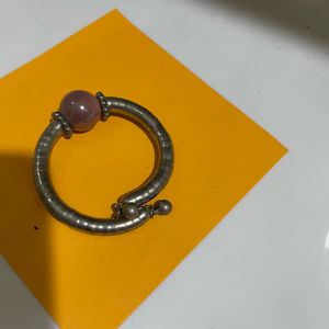 Unique Silver Tone Bangle with Pink Bead Accent