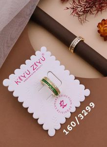Chic Link Chain Ring with Emeralds