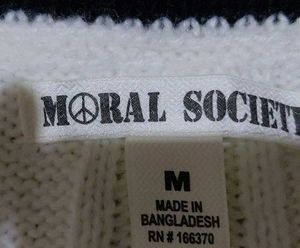 White knitted sweater vest