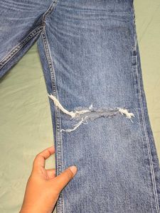 ZARA Ripped Knee Jeans