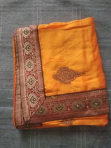 Elegant Orange Silk Saree with Embellishments