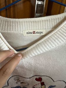 White sweater
