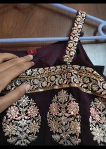 Embroidered Peplum Top