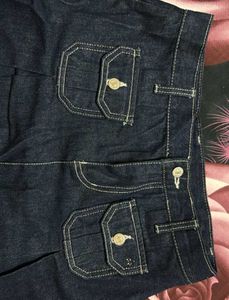 Dark Wash Denim Pleated Mini Skirt