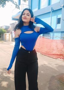 Stylish Blue Cut-out Top with Black Pants