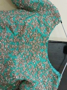 Exquisite Embroidered Teal Saree blouse only