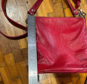 Red sling bag
