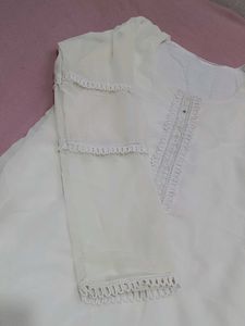 mustard colour plazo and off white top